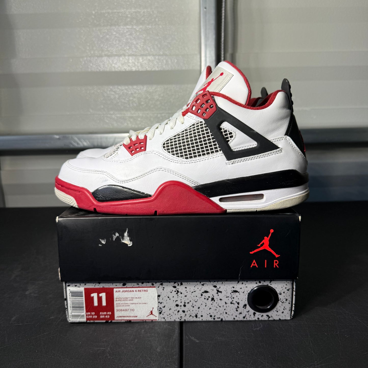 Size 11 - AJ 4 Fire Red 2012 Release