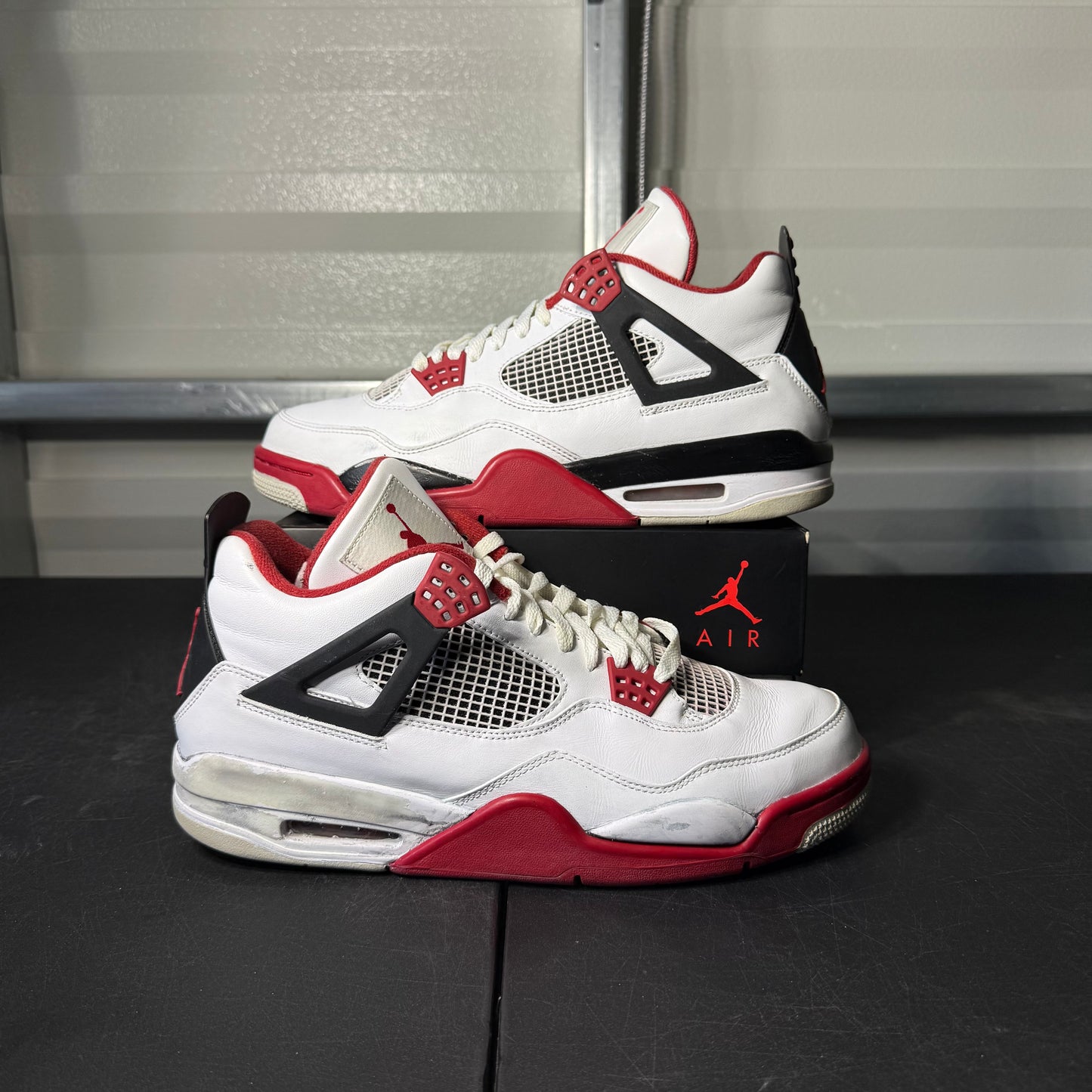 Size 11 - AJ 4 Fire Red 2012 Release