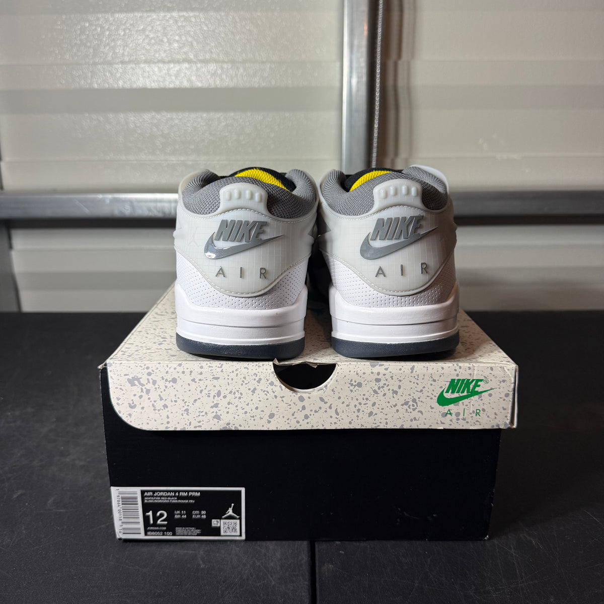 Size 12 - AJ 4 RM Low Smoke Grey Fire Red