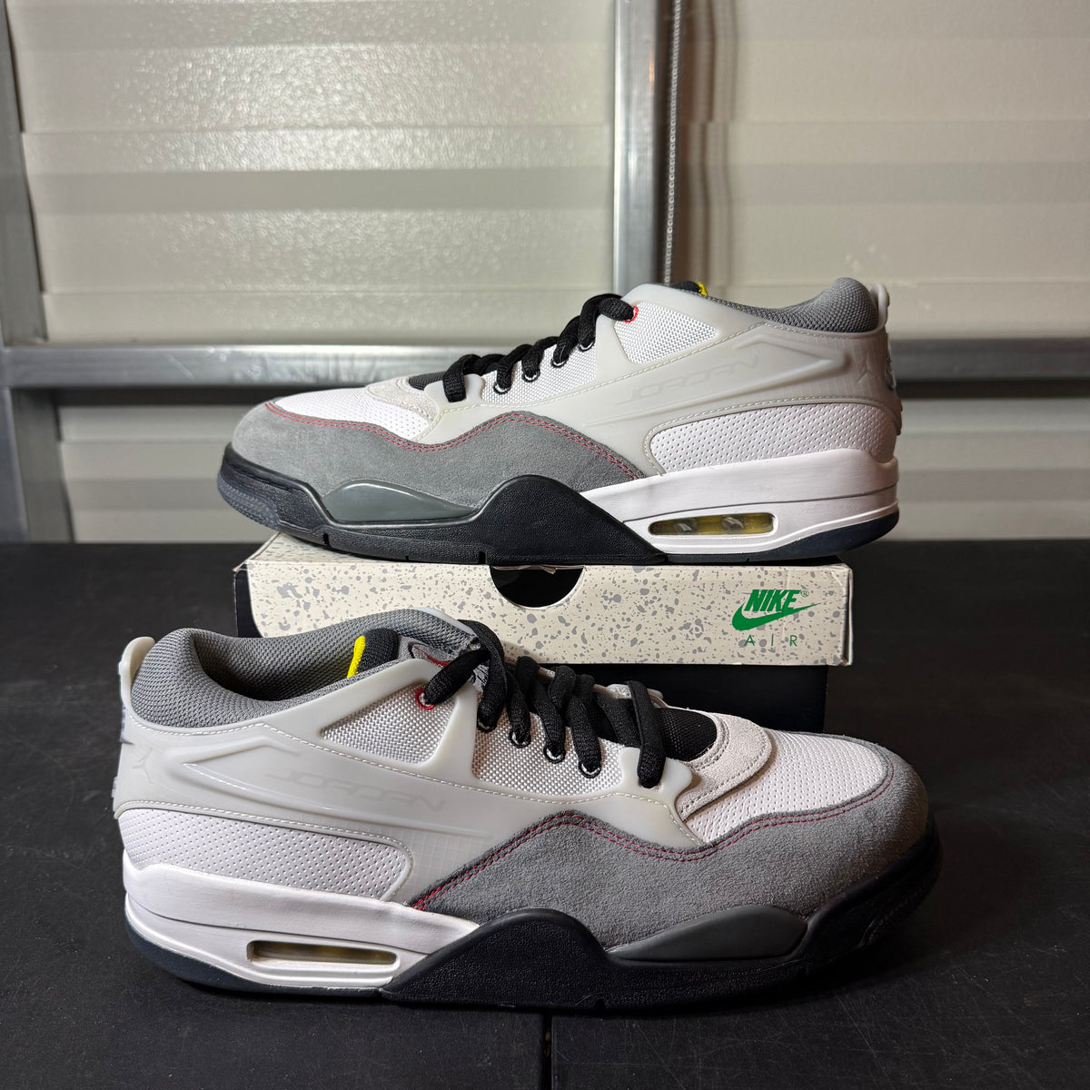 Size 12 - AJ 4 RM Low Smoke Grey Fire Red