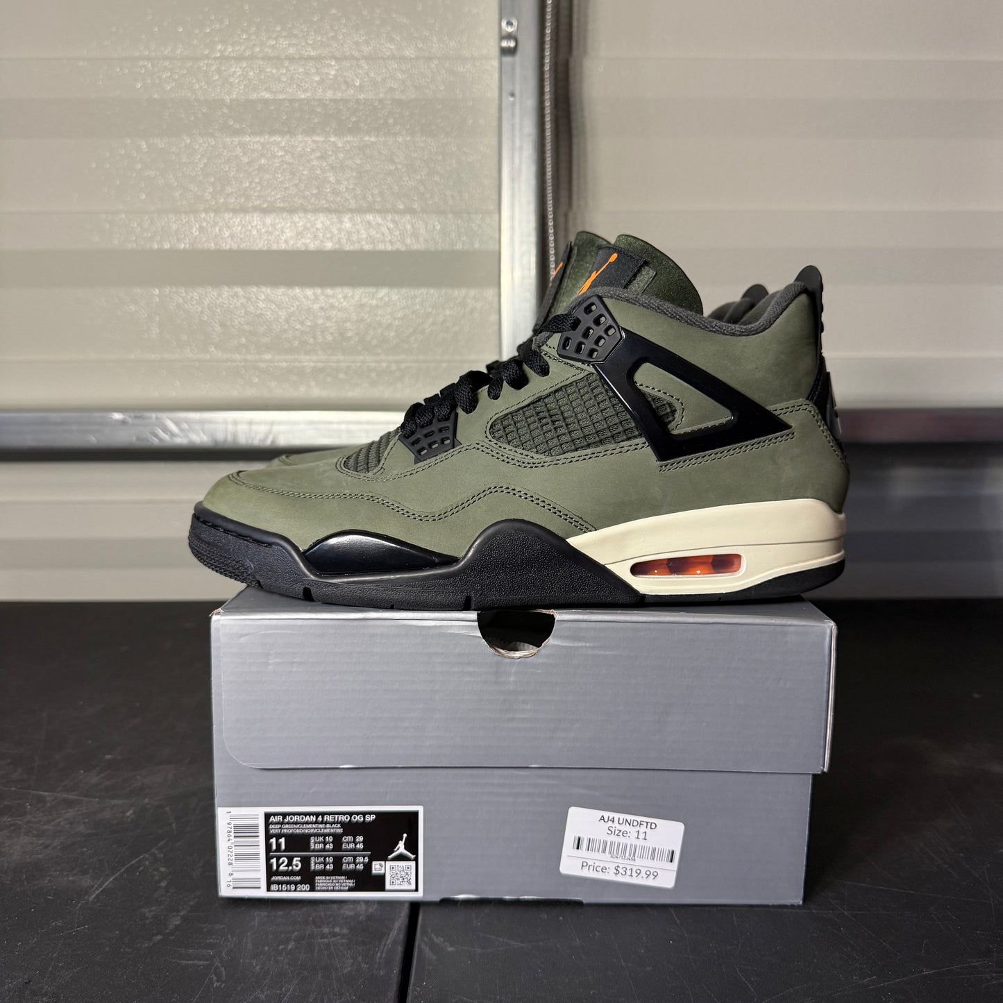 Size 11 - AJ 4 Retro Undefeated