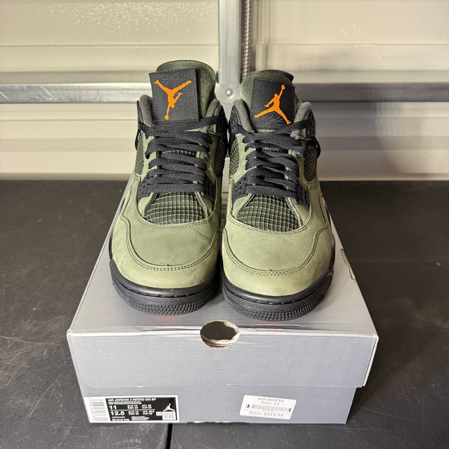 Size 11 - AJ 4 Retro Undefeated