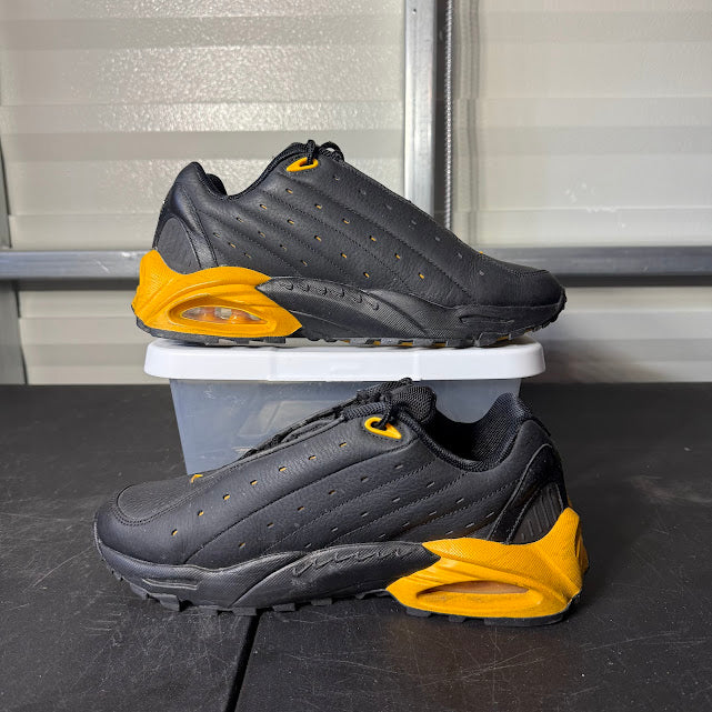 Size 9 - NOCTA Hot Step Air Terra Black University Gold