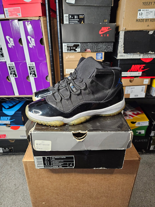 Size 7 - AJ 11 Retro 2009 Space Jam